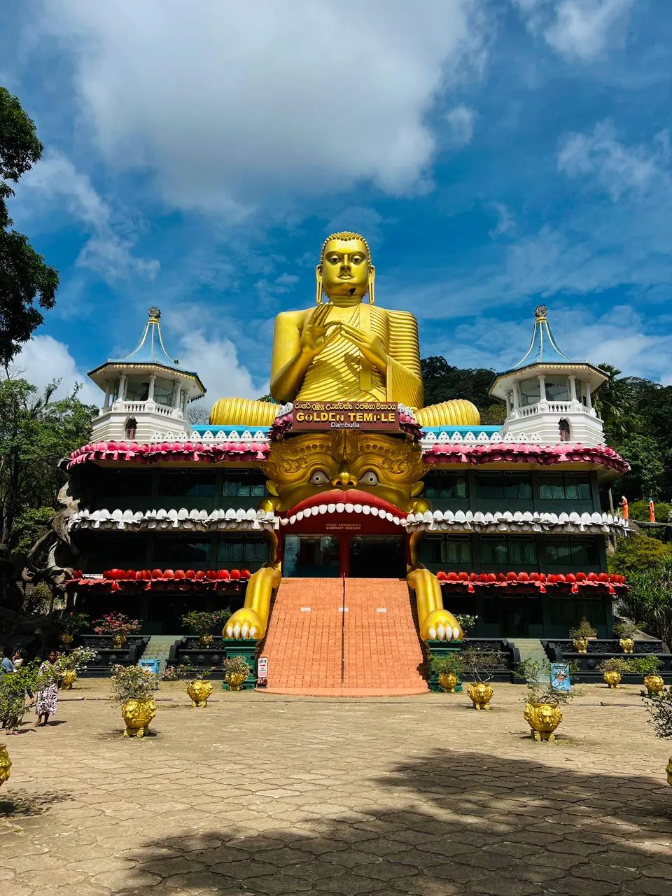 The giant golden Buddha above the entrance to the Golden Temple at Dambulla